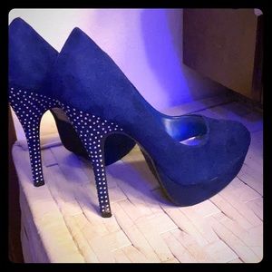 Blue pumps with studded heels